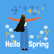 The girl looks at the arriving birds on a blue background with large daisies. Symbolic image of the arrival of spring