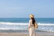 Travel woman walk on the beach