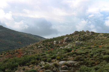 View from the top of the mountains of the Serra da Estrela natural park, village of Sabugueiro. Cloudy and rainy day. 