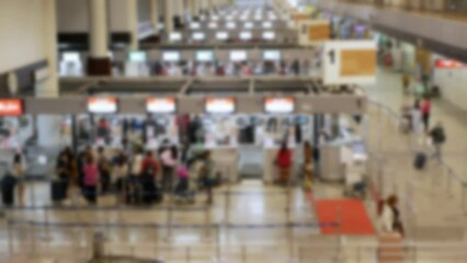 Canvas Print - out of focusing blurred of crowded people passenger lines in airport waiting and check at check in counter area, open country, crowd in International Airport