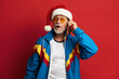 © puhhha - Happy Man Using Smartphone. Senior Man in Santa Hat Smiling Calling Cellphone, Chatting, Enjoying Mobile Service. Empty Copy Space for Advertisement, Indoor Studio Shot