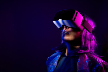 Sticker - Woman in virtual reality goggle in neon colors.