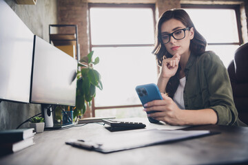 Poster - Photo of serious confident lady boss wear spectacles reading messages modern gadget indoors workplace workshop