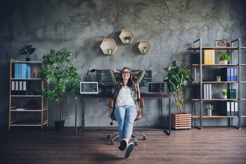 Photo of positive smiling lady freelancer wear glasses enjoying pause hands arms head indoors workstation workshop