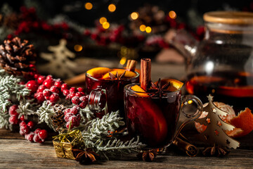 Wall Mural - christmas hot mulled wine hot warming drink with spices and oranges