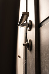 Real human teeth hanging on the door handle. Pulled out tooth. Dentistry concept. Do-It-Yourself Dentistry. Pull your own tooth. Fear of dentists.