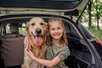 Sticker - Preteen girl with golden retriever dog in the car