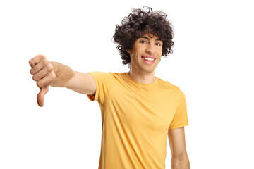 Canvas Print - Guy with curly hair showing a thumb down sign