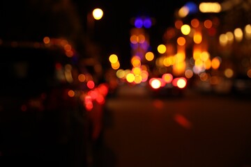 Wall Mural - Blurred view of city street with lights at night. Bokeh effect