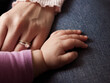 mother and daughter hands, infant, child