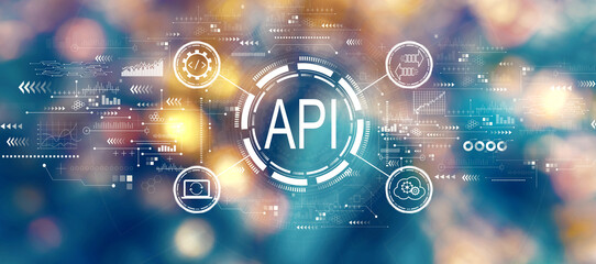 Wall Mural - api - application programming interface concept with blurred city lights at night