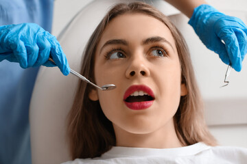 Sticker - Young woman visiting stomatologist in clinic, closeup