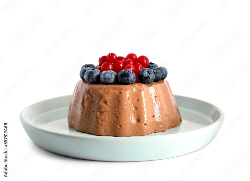 Delicious chocolate pudding with fresh berries on plate isolated on white background