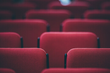 Wall Mural - Indoor concert background abstract seats in concert hall people performing music instruments in symphony orchestra