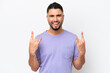 © luismolinero - Young Arab handsome man isolated on white background making horn gesture
