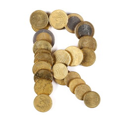 Wall Mural - Euro metal coins in shape letter R isolated on white, top view