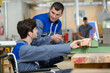 © auremar - handicapped apprentice at woodworking industry