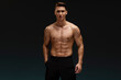© speed300 - Strong athletic man fitness model posing with naked torso showing six pack abs