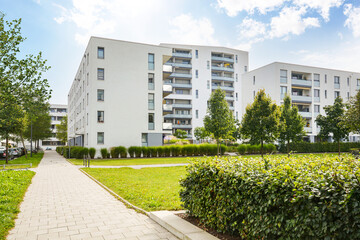 cityscape of a residential area with modern apartment buildings, new green and sustainable urban lan