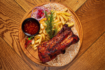 Sticker - grilled ribs with french fries