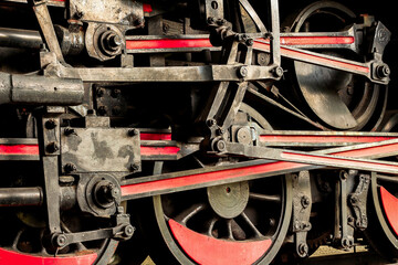 Steam locomotive wheels stacking closeup 