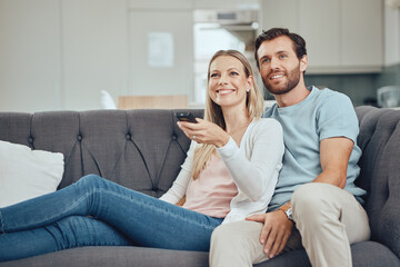 Couple, home and watch television, happy on sofa with streaming movie or tv show, smile with remote control. Commitment, bond and love with routine, spending quality time in living room watching tv.