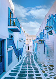 Fototapeta Uliczki - Mykonos Greece, colorful streets of the old town of Mykonos, Traditional narrow street with blue doors and white walls, Mykonos town Greece