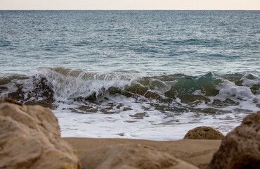 ocean wave crushing on the beach