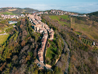 Italy, December 2022: aerial view of the beautiful medieval village of Mondaino in the province of Rimini in the Emilia Romagna region bordering the Marche region