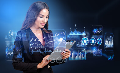 Wall Mural - Businesswoman working with tablet in hand, big business data analysis