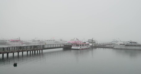 Wall Mural - Foggy weather in Sun moon lake jetty pier at Nantou of Taiwan