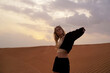 © brillianata - Young woman in the desert. The concept of happiness, freedom, travel