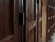 dark brown wooden shop door closed at sham