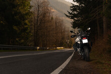 Triumph Tiger Motorcycle In Mountains