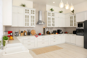 Wall Mural - Beautiful kitchen interior with stylish modern furniture