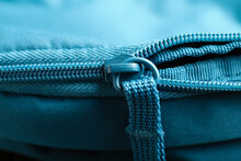Closeup View Of Blue Clothes With Zipper
