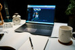 © Lazy_Bear - Workplace at home office with laptop, cup of coffee and lamp on desk for working at night