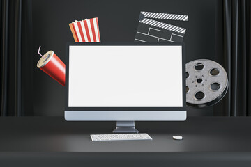 Online cinema movie watching concept with blank white modern computer monitor screen with space for your logo or text on dark cinema background with popcorn and film-strip. 3D rendering, mockup