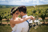 Fototapeta Na sufit - Wedding couple, bride and groom in the vineyards of Rheinhessen