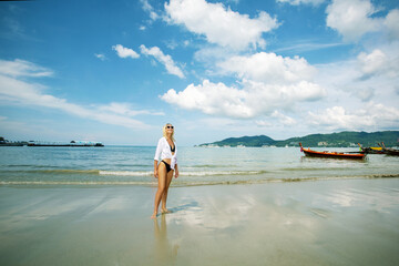 Wall Mural - Portrait beautiful mature caucasian woman relax smile leisure on the beach sea ocean in travel vacation. Happy woman enjoy freedom at the beach. at sunset.