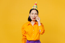 Sad Depressed Upset Displeased Young Woman Wear Casual Clothes Celebrating Don't Want To Become Old Cry Wiping Tears With Hand Isolated On Plain Yellow Background. Birthday 8 14 Holiday Party Concept