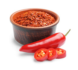 Wall Mural - Bowl of chipotle chili flakes and fresh jalapeno pepper on white background