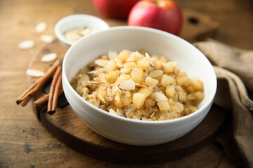 Wall Mural - Homemade oatmeal porridge with apples