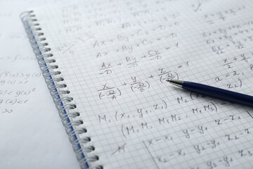 Wall Mural - Notebook with different mathematical formulas and pen, closeup