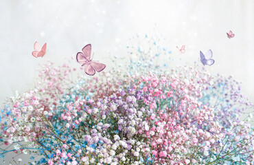 Fotomurales - Beautiful gentle spring light background image in pink pastel colors with fluffy small flowers and a group of butterflies fluttering over flowers.