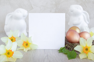 Home interior with easter decor. Daffodils, spring flowers on a light background. Copy space