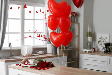 Sticker - Engagement ring, cup of tea, croissants and roses on counter in kitchen decorated for Valentine's Day