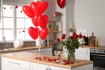 Sticker - Engagement ring, vase with roses and glasses of champagne on counter in kitchen decorated for Valentine's Day