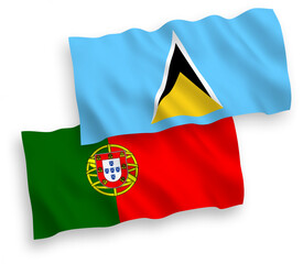 National vector fabric wave flags of Portugal and Saint Lucia isolated on white background. 1 to 2 proportion.