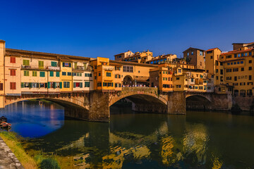 Wall Mural - Close up of silversmith shops on the famous Ponte Vecchio bridge on the Arno River in Centro Storico, Florence, Italy